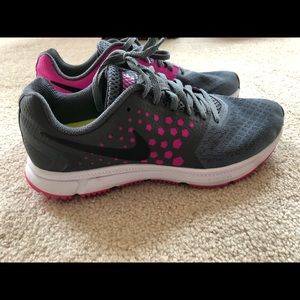 Super cute gray and hot pink/purple Nikes. Worn 1x
